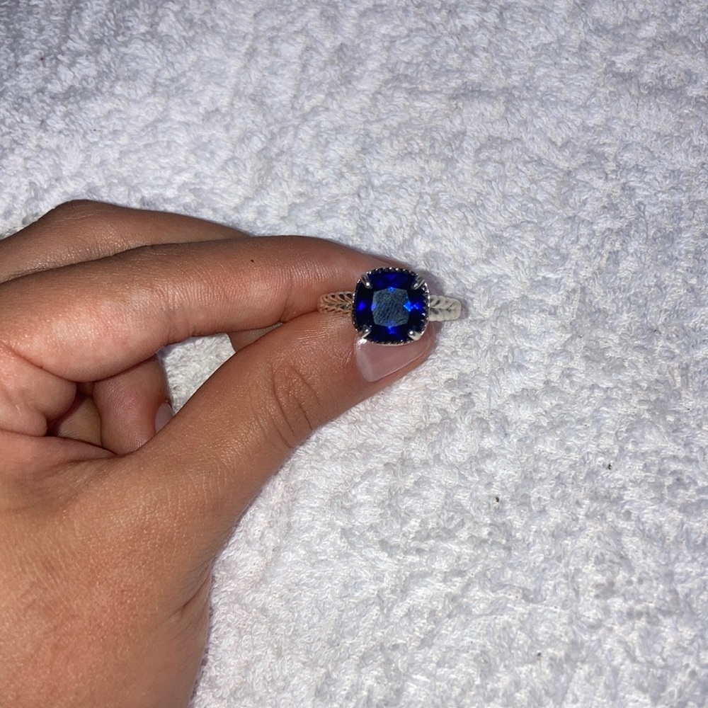 Silver ring with blue gem size 8